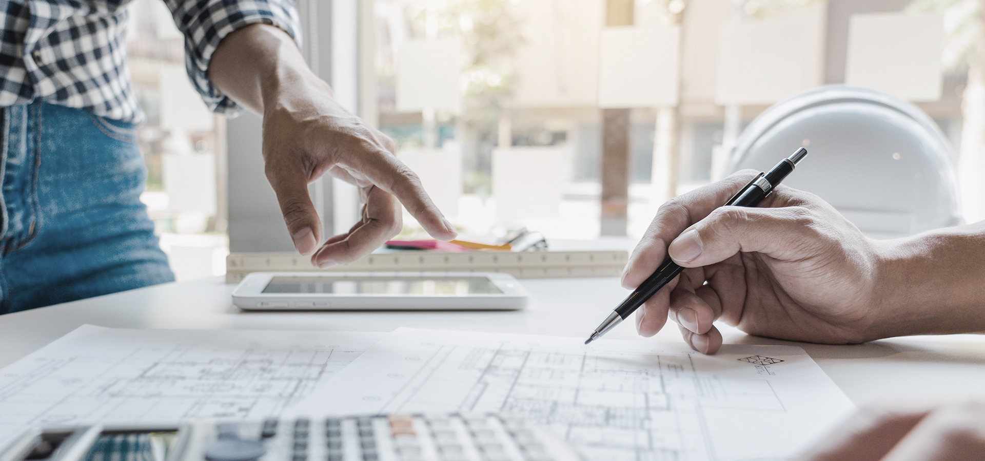 engineer Hand Drawing Plan On Blue Print with architect equipmen